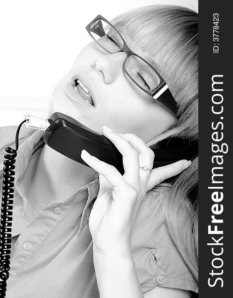 Attractive woman having conversation over the phone. Attractive woman having conversation over the phone