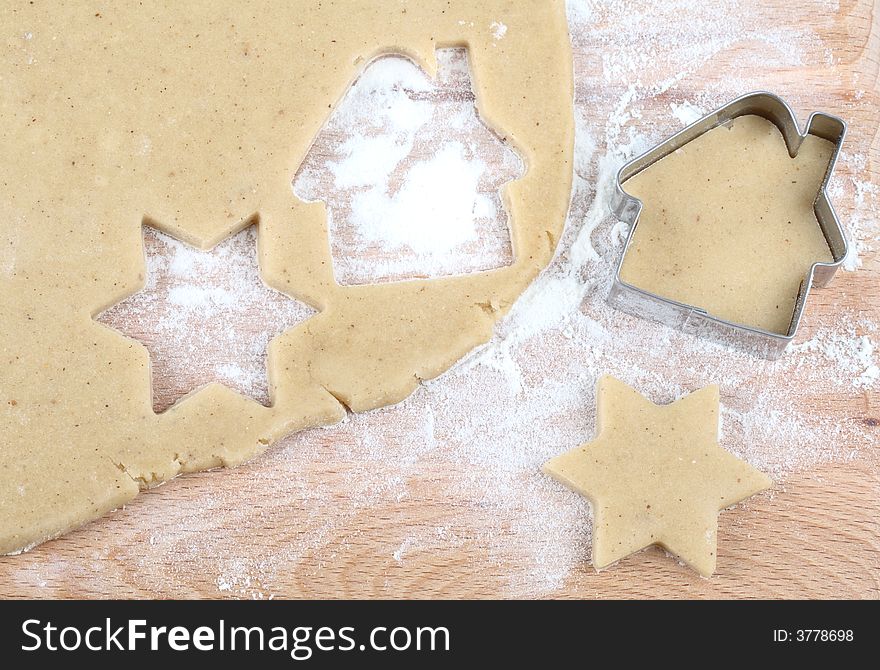 Baking christmas cookies- dough, flour