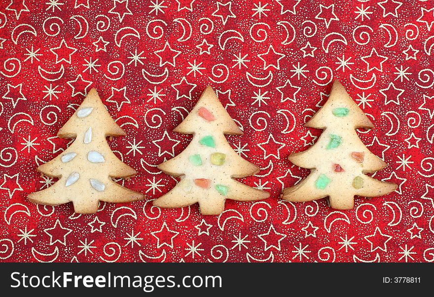 Gingerbread cookies on christmas background