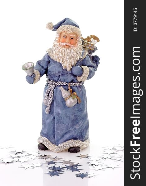 Blue Santa Claus figure with silver stars on light background
