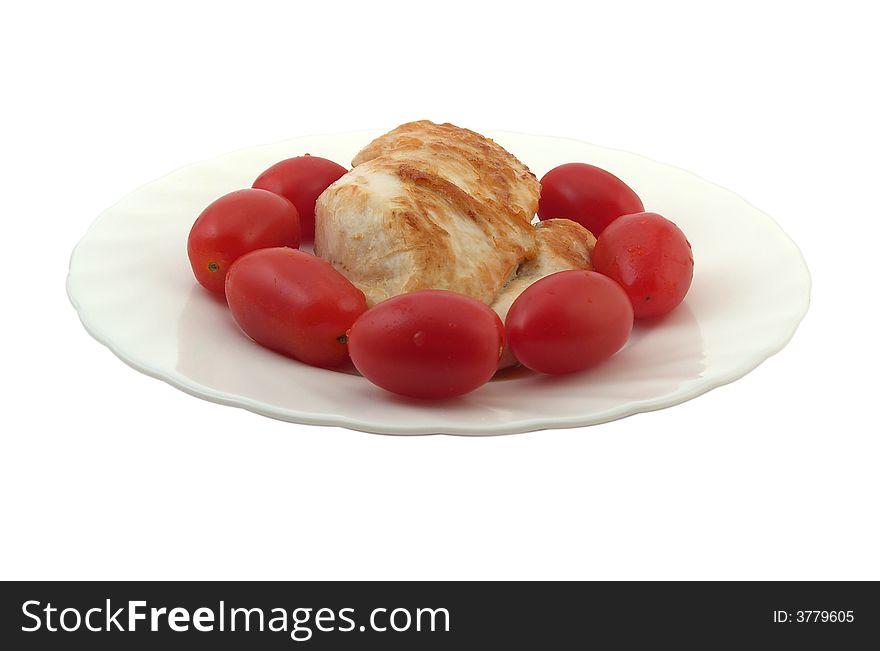 Fried chicken meat with tomatoes, on white background.