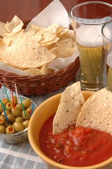 Chips, Salsa, Olives And Beer Royalty Free Stock Photos
