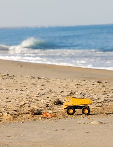 Yellow Toy Truck On Beach Stock Photo Yellow Toy Truck On Beach Stock Photo