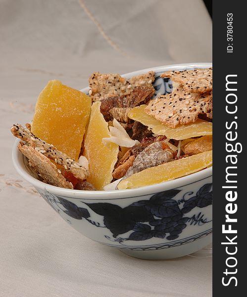 Dried fruit and crackers in a bowl