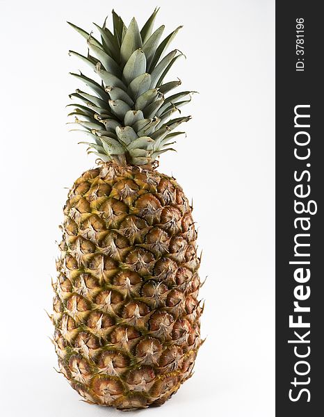 Big pineapple on white background