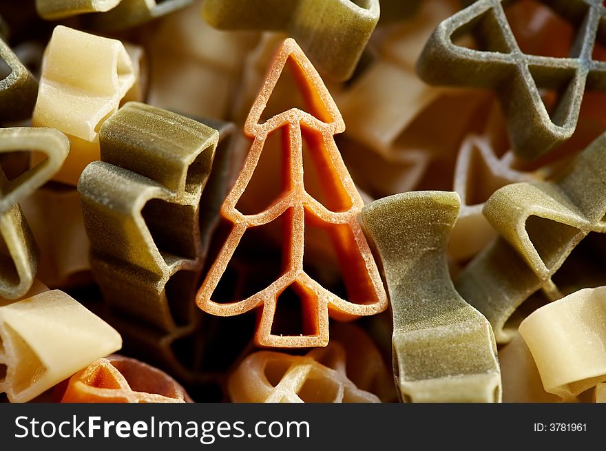Colourfull christmas decorations- stars and trees made from pasta. Colourfull christmas decorations- stars and trees made from pasta.