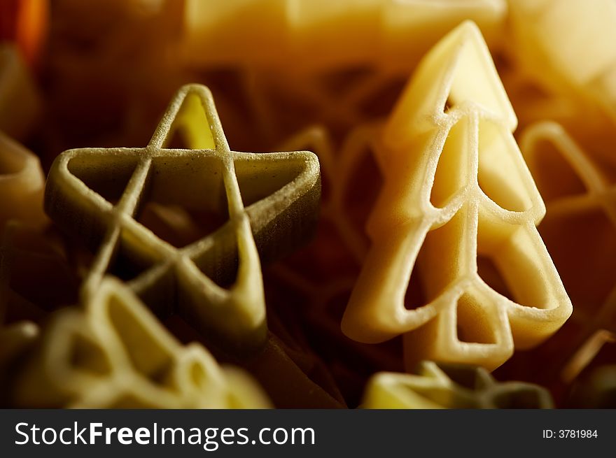 Colourfull christmas decorations- stars and trees made from pasta. Colourfull christmas decorations- stars and trees made from pasta.