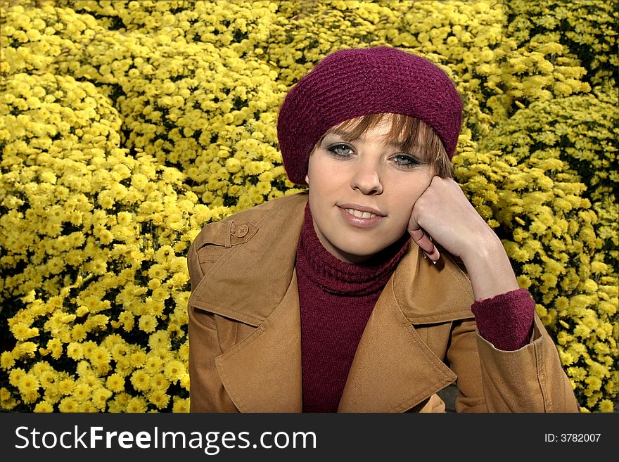 Fashion friendly smiling girl portrait outdoors buying roses.