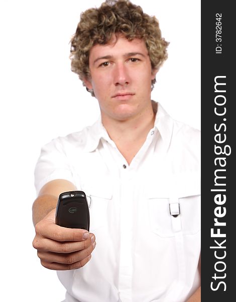 Man holding remote , remote in focus with out of focus face. Man holding remote , remote in focus with out of focus face