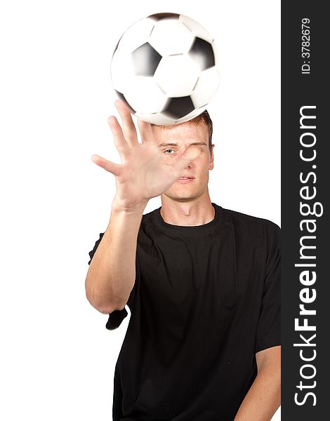 Soccer player throwing the ball in the air