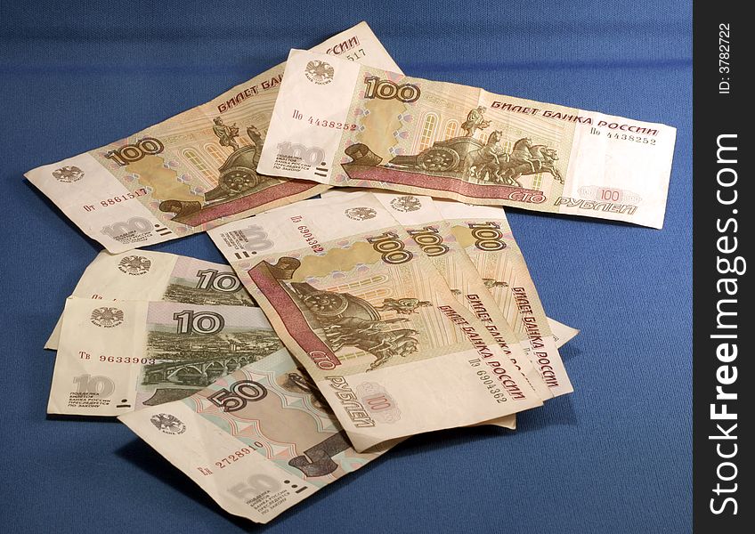 A rambled pile of russian money including hundreds, fiftys, and tens