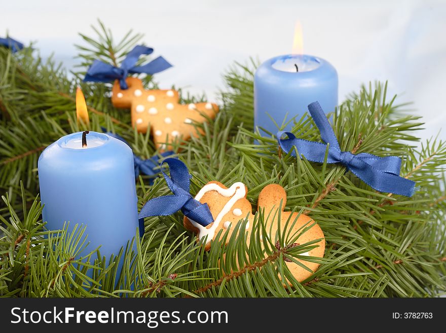 Christmas- blue candles, pine, gingerbread cookies. Christmas- blue candles, pine, gingerbread cookies