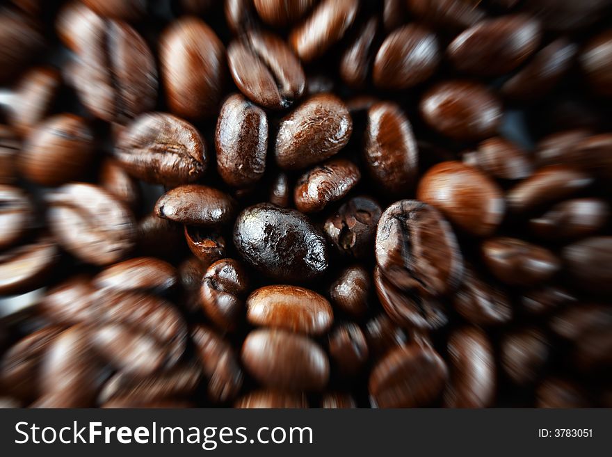 Macro closeup of coffee beans with zoom effect. Macro closeup of coffee beans with zoom effect