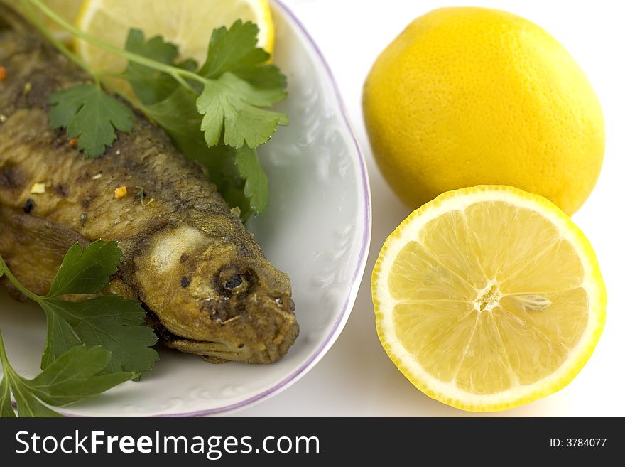 Roasted fish with lemon and parsley