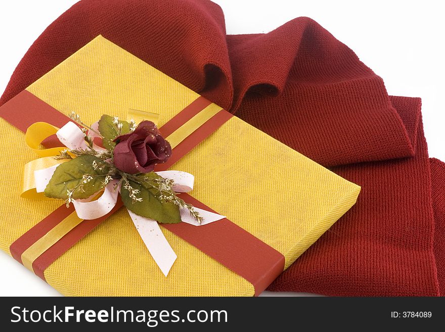 Yellow gift box and red scarf. Yellow gift box and red scarf