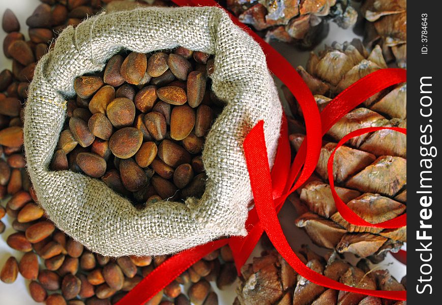 New Year still life with nuts and red ribbon. New Year still life with nuts and red ribbon