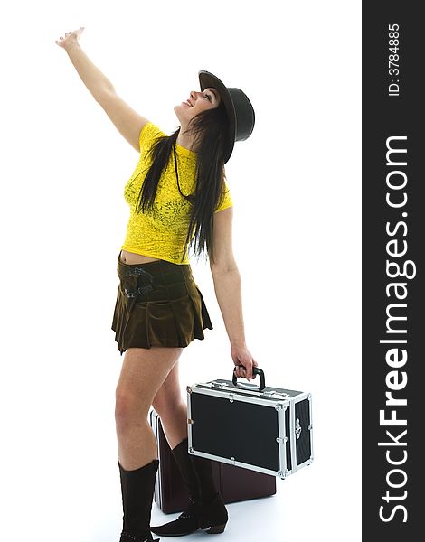 Beautiful brunette with valise on isolated background