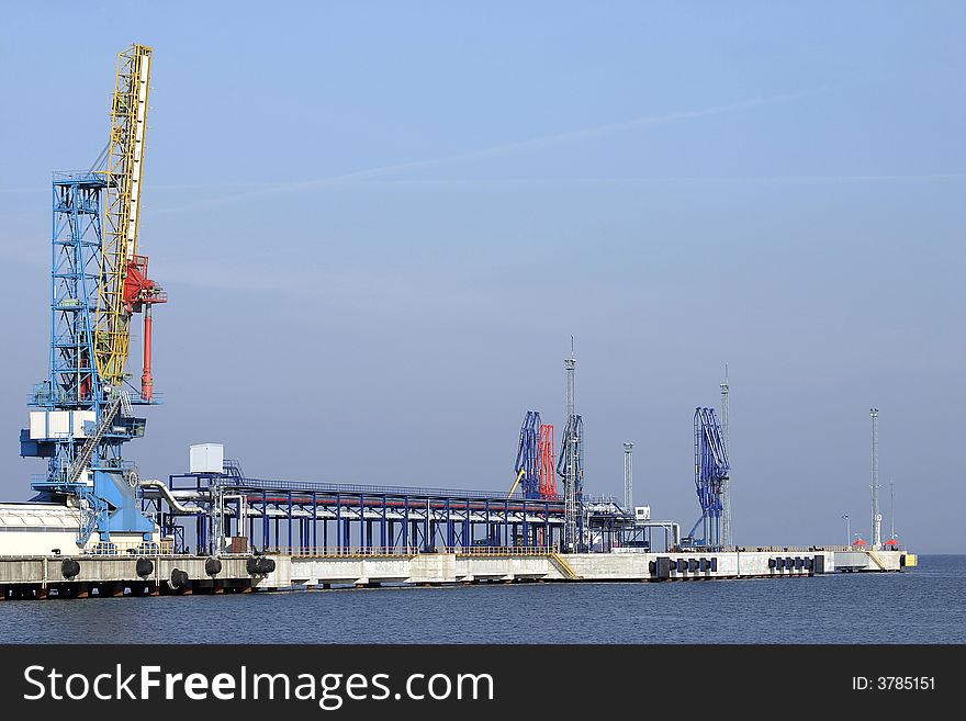 Fuel harbour with blue sky and sea. Fuel harbour with blue sky and sea