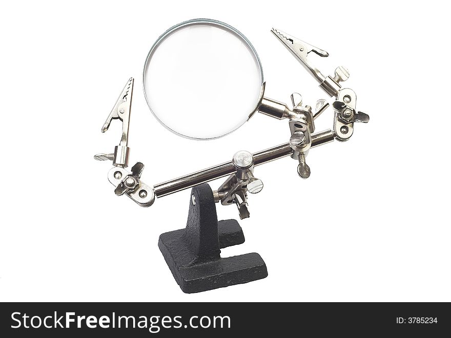 Magnifying glass on metallic stand with grip on white background. Magnifying glass on metallic stand with grip on white background