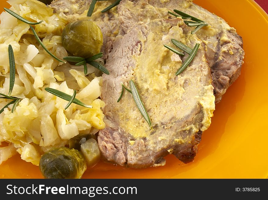 Pork dish with salad close-up