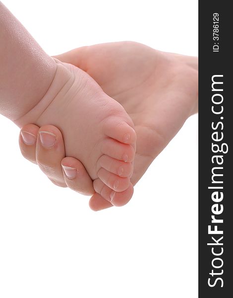 Mother holding babys foot upclose isolated on a white background