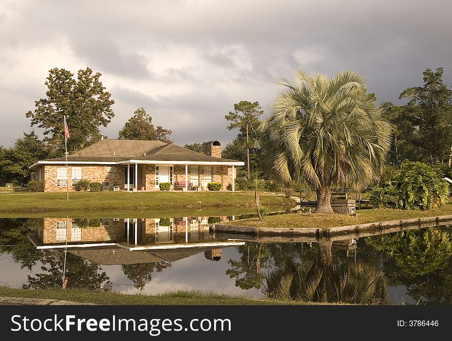 A small private office by a lake and fountain. A small private office by a lake and fountain