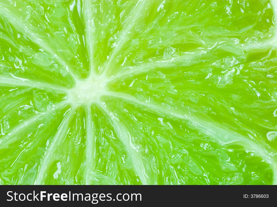 Macro of a fresh lime fruit for backgrounds. Macro of a fresh lime fruit for backgrounds