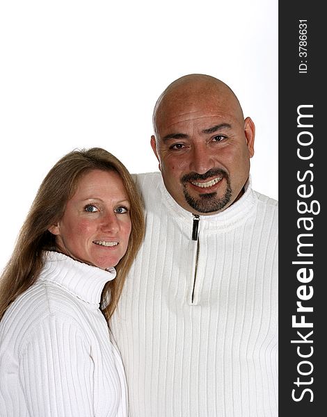 Attractive couple in white sweaters