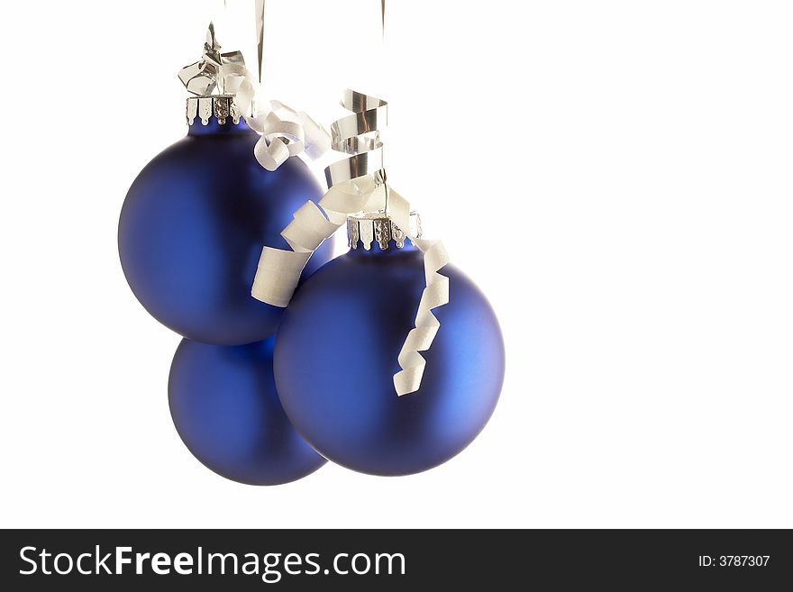 Three shiny blue Christmas balls isolated on white background. Three shiny blue Christmas balls isolated on white background