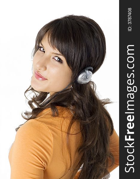 Young brunette girl with headphones listening music. Young brunette girl with headphones listening music.