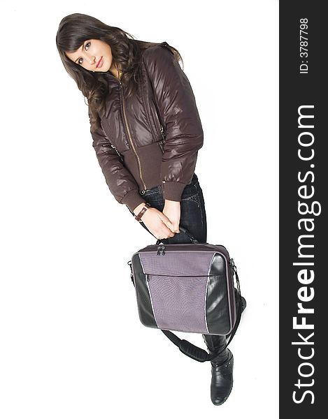 Young brunette teenager girl with laptop bag on white background.