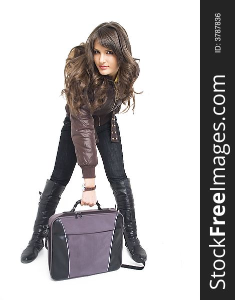 Young brunette teenager girl with laptop bag on white background.