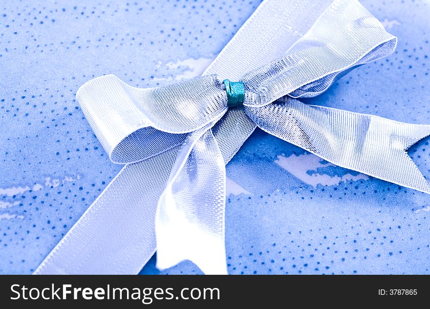 Ribbon On The Blue Background.