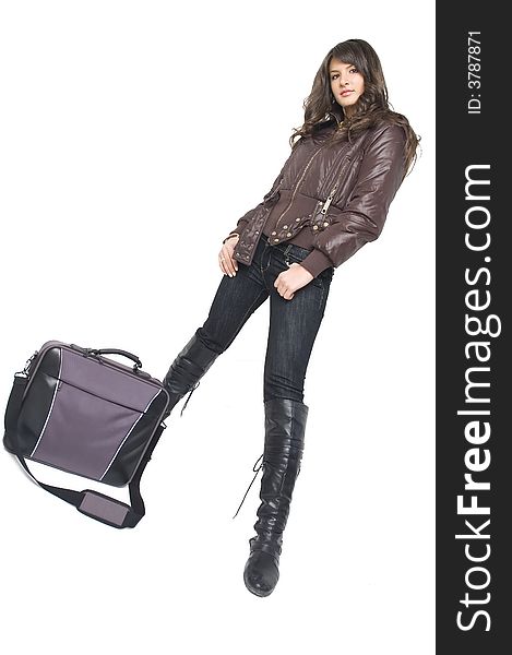 Young brunette teenager girl with laptop bag on white background.