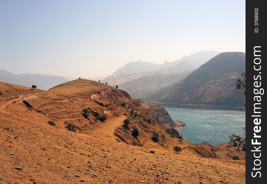 Hill on bank of Charvak lake near Brichmulla village, Uzbekistan, summer 2007. Hill on bank of Charvak lake near Brichmulla village, Uzbekistan, summer 2007