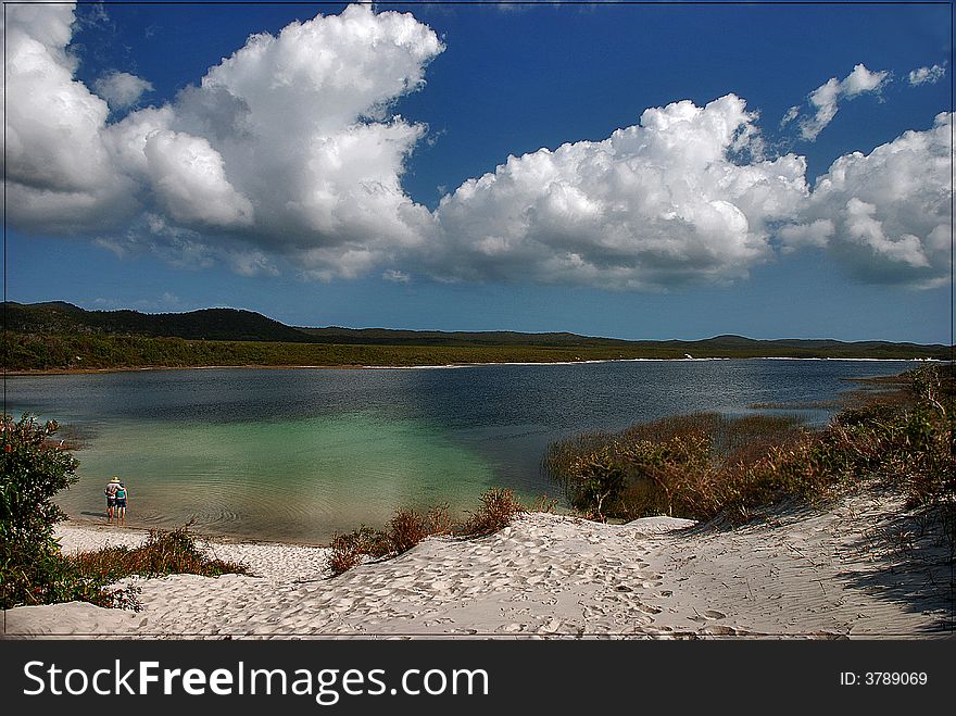 Romantic couple on the Blue lagoon, Moreton island in australia.