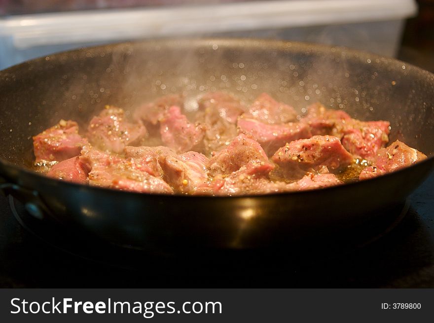 Beef Tenderloin Pieces Grilling In A Frying Pan