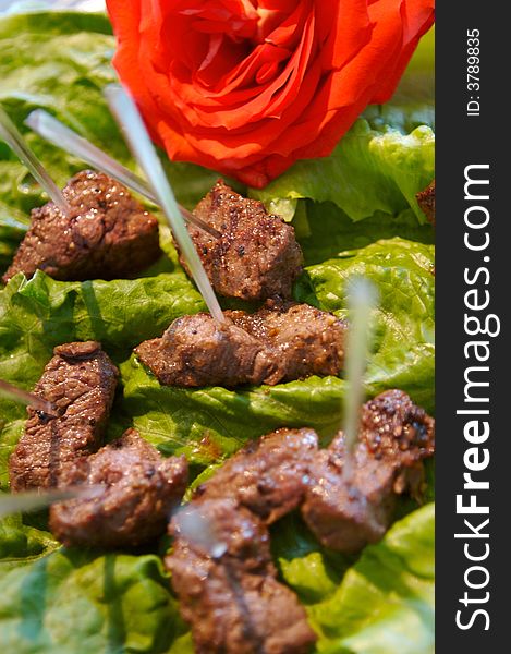 Beef on a stick beening served