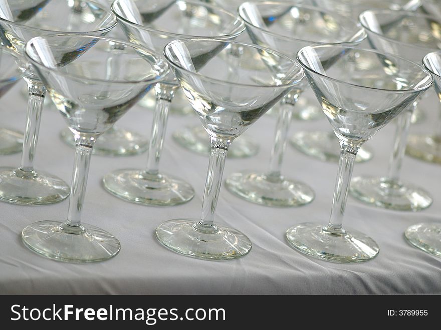 Rows Of Martini Glasses On A White Cloth