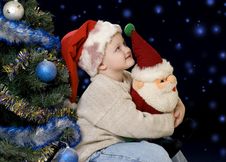 The Boy And Christmas Night Stock Photo
