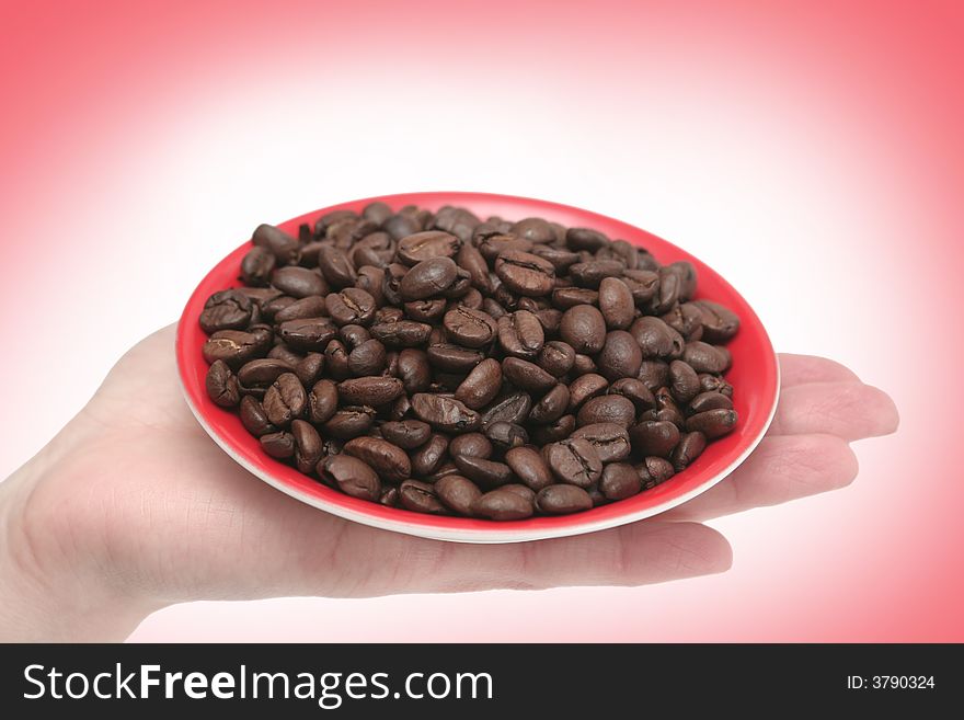 It is a lot of grains of coffee lay in hands