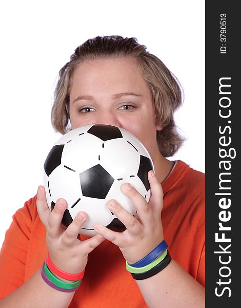 Soccer fan holding football in front of face. Soccer fan holding football in front of face