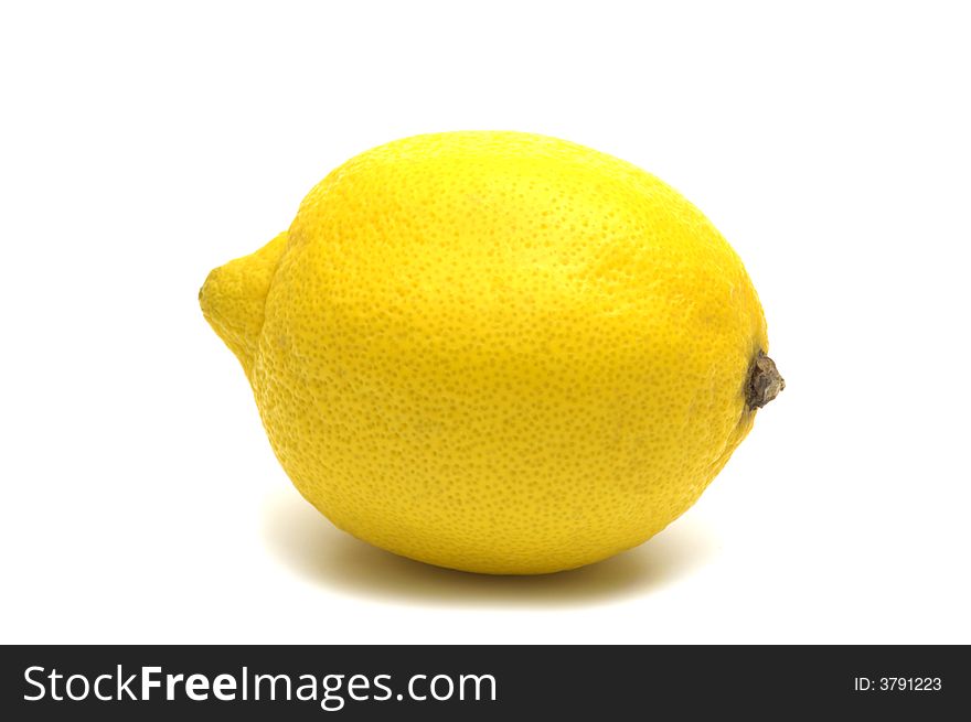 One lemon on white background