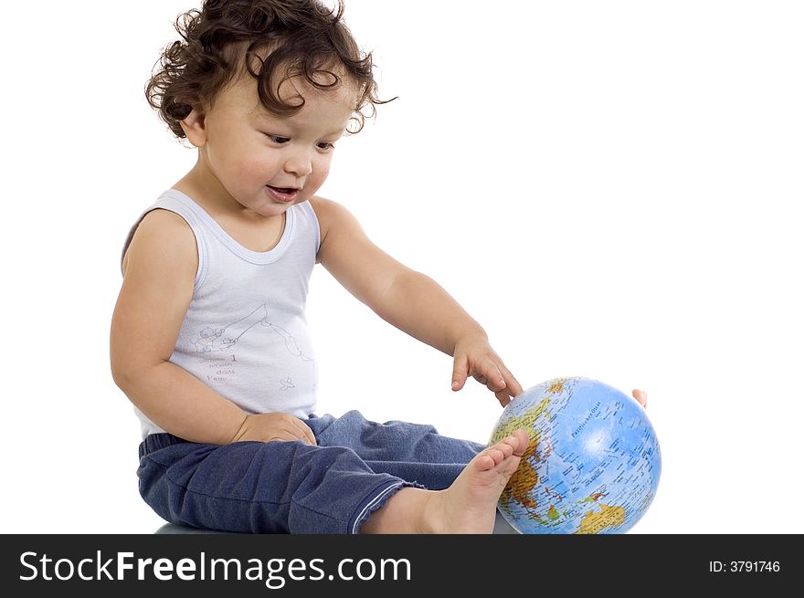 Child playing with globe,isolated on a white background. Child playing with globe,isolated on a white background.