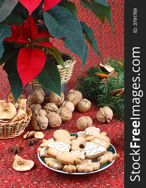 Advent wreath, gingerbread cookies, walnuts, dried apples. Advent wreath, gingerbread cookies, walnuts, dried apples