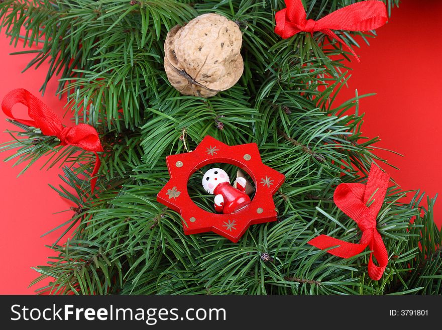 Christmas decoration- red andel, walnut, ribbon