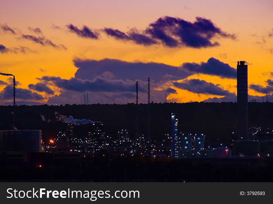 A suggestive industrial sunset in sicilian landscape