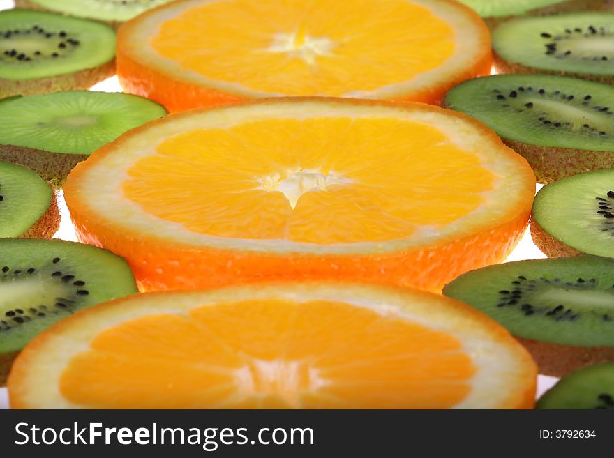 Orange and kiwi slices background