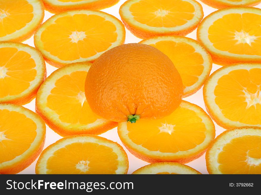 Slices of fresh oranges background. Slices of fresh oranges background