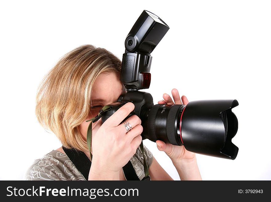 Young woman with camera isolated over white